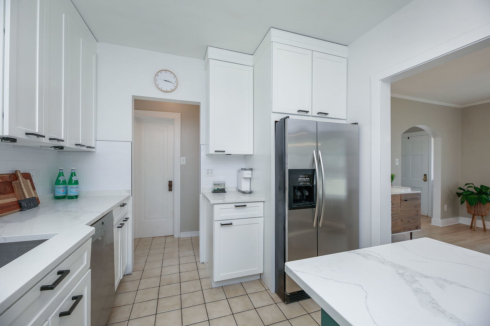429 East Illinois Street Wheaton, IL 60187 - Photo 10 of 30 a kitchen with a refrigerator and a sink
