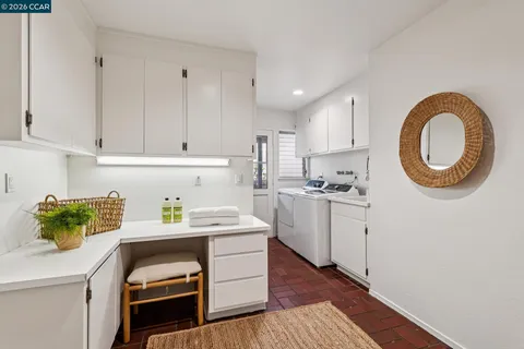 a bedroom with a bed and a sink