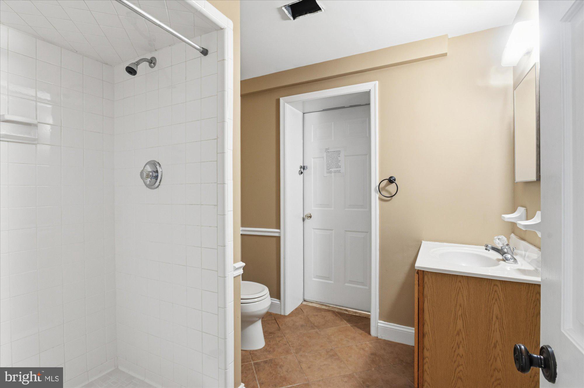 10019 Kendale Road Potomac, MD 20854 - Photo 53 of 64 Lower level Full bath#4 with exit to changing room
