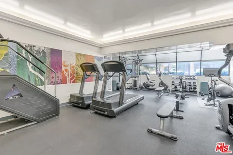 a view of a room with gym equipment