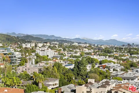 a view of city and mountain
