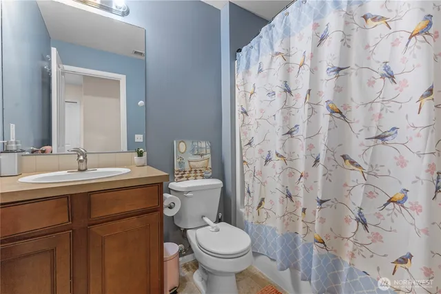 a view of a backyard with sitting area