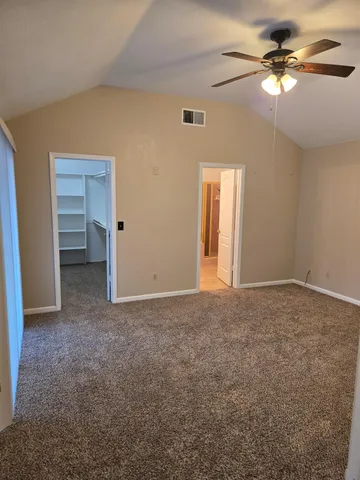 a view of an empty walk in closet