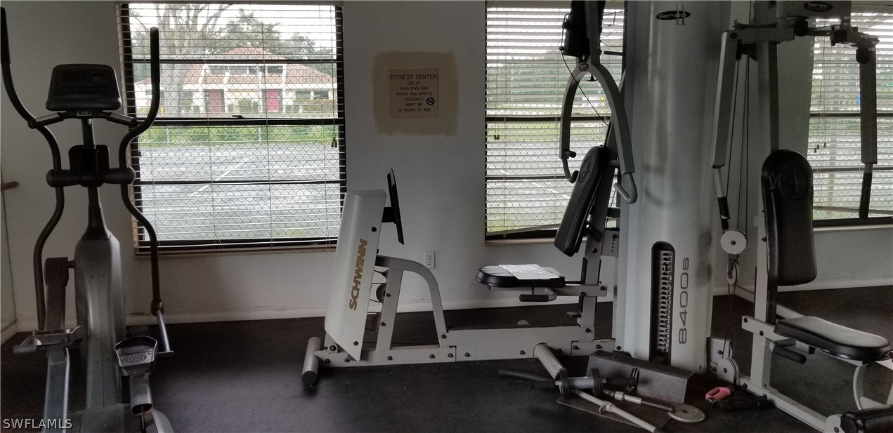 5311 Summerlin Road, Unit 1115 Fort Myers, FL 33919 - Photo 13 of 14 a view of a room with gym equipment