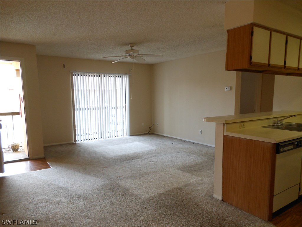 5311 Summerlin Road, Unit 1115 Fort Myers, FL 33919 - Photo 2 of 14 a view of an empty room with a window
