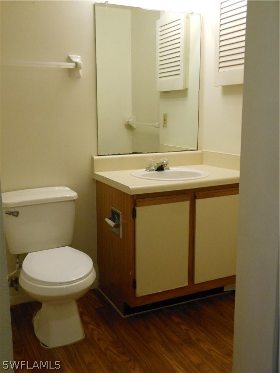 5311 Summerlin Road, Unit 1115 Fort Myers, FL 33919 - Photo 6 of 14 a bathroom with a sink and a toilet