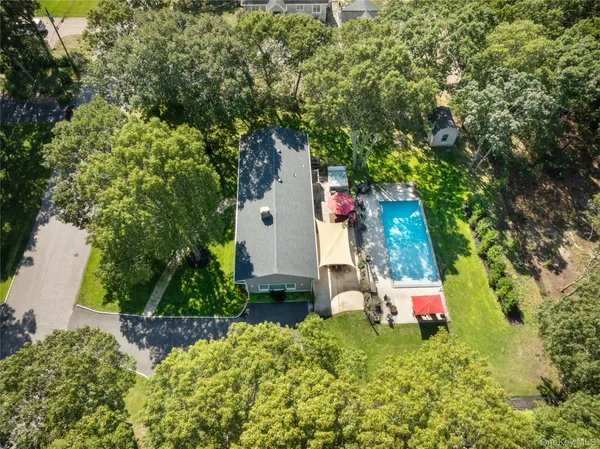 a backyard of a house with lots of green space