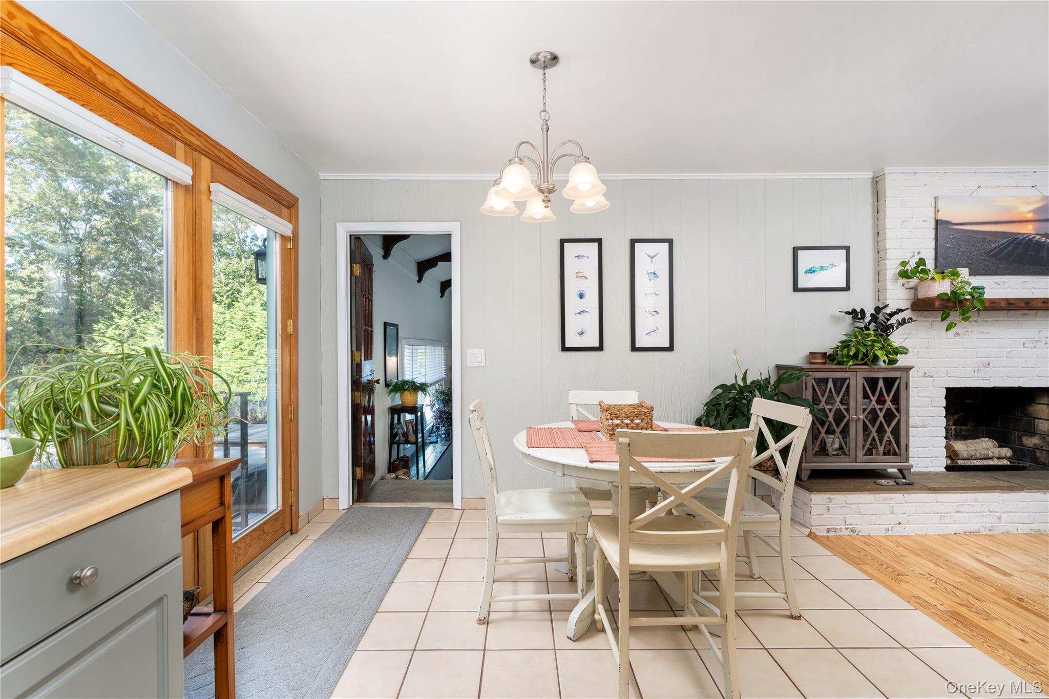 8 Foxboro Road Hampton Bays, NY 11946 - Photo 18 of 50 a dining room with furniture and window