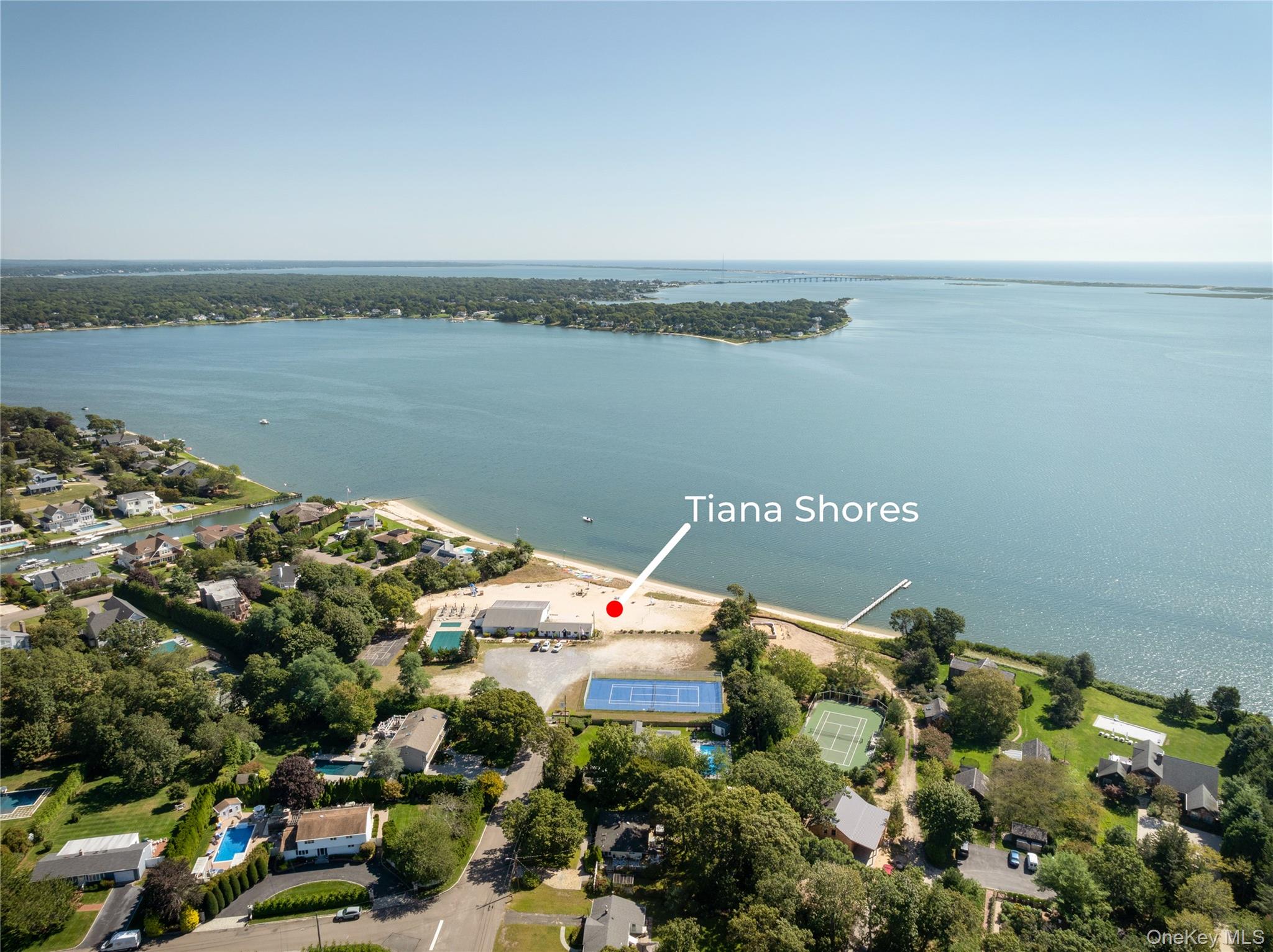 8 Foxboro Road Hampton Bays, NY 11946 - Photo 45 of 50 a aerial view of a house with a lake view