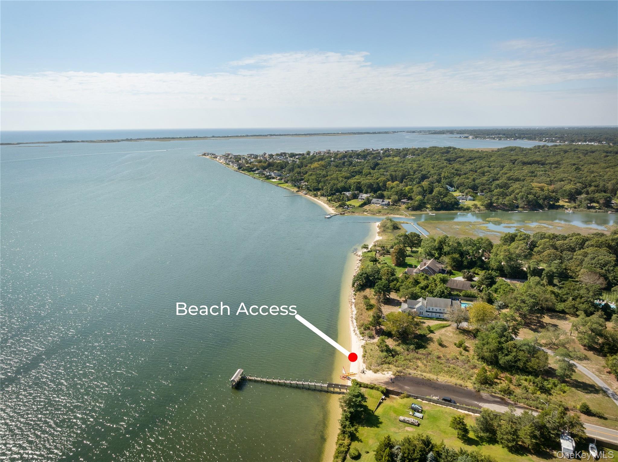 8 Foxboro Road Hampton Bays, NY 11946 - Photo 46 of 50 an aerial view of a houses with ocean view
