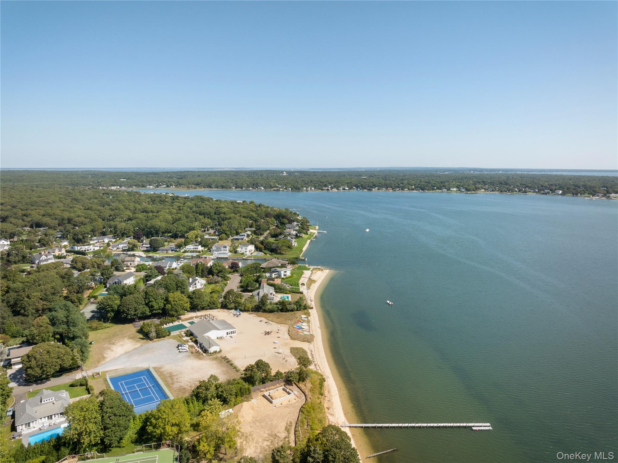 8 Foxboro Road Hampton Bays, NY 11946 - Photo 47 of 50 an aerial view of a house
