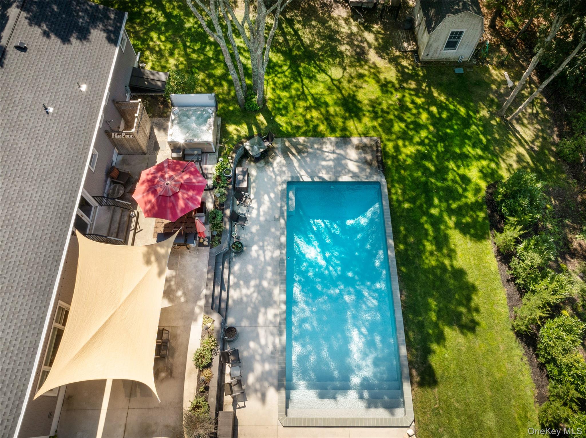 8 Foxboro Road Hampton Bays, NY 11946 - Photo 48 of 50 a front view of a house with a tree