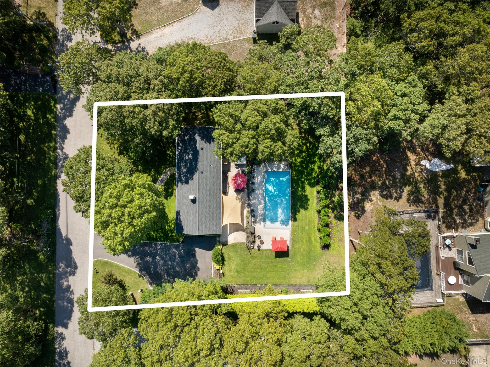 8 Foxboro Road Hampton Bays, NY 11946 - Photo 10 of 50 a view of a small yard