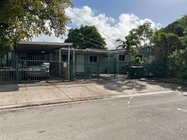501 East 8th Street Hialeah, FL 33010 - Photo 5 of 7 a front view of a house having yard