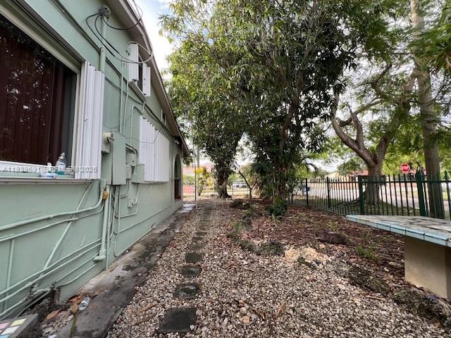 501 East 8th Street Hialeah, FL 33010 - Photo 7 of 7 a backyard of a house with lots of green space