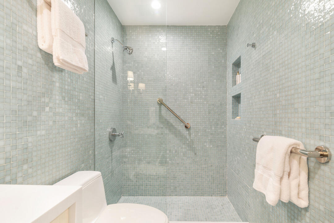 44 Cocoanut Row, Unit 320B Palm Beach, FL 33480 - Photo 12 of 27 a bathroom with a toilet and shower