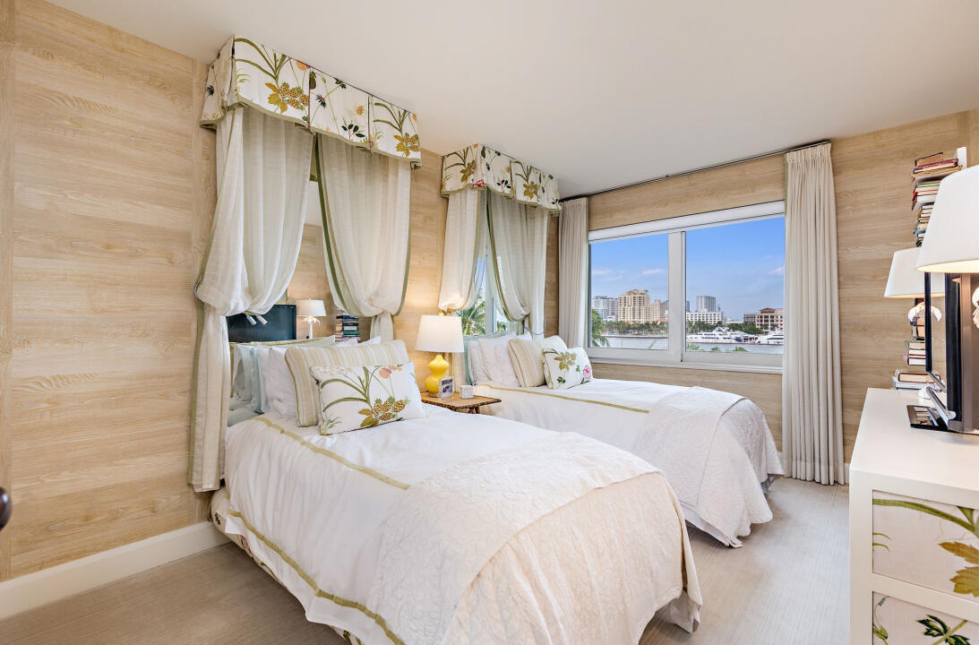 44 Cocoanut Row, Unit 320B Palm Beach, FL 33480 - Photo 14 of 27 a bed room with a bed and a flat tv screen