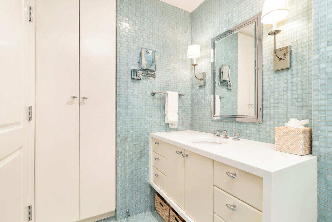 44 Cocoanut Row, Unit 320B Palm Beach, FL 33480 - Photo 16 of 27 a bathroom with a sink and a mirror