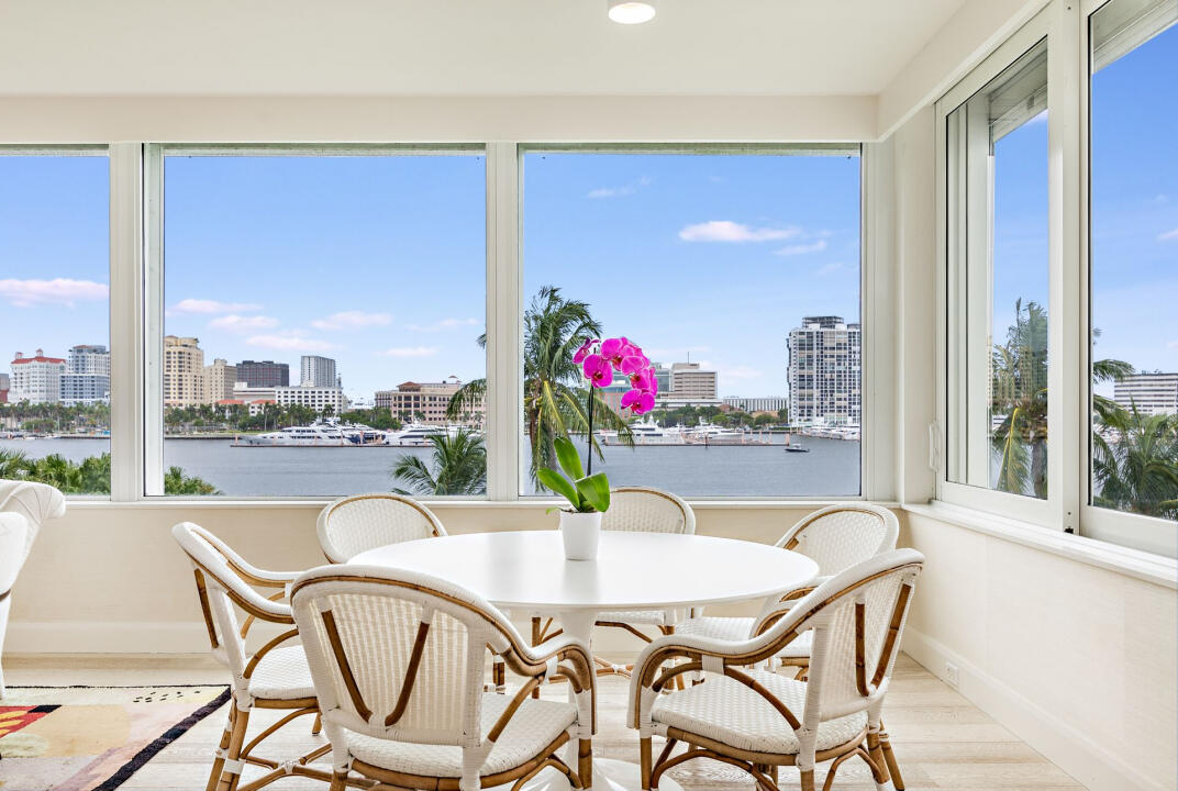 44 Cocoanut Row, Unit 320B Palm Beach, FL 33480 - Photo 4 of 27 a dining room with furniture and a floor to ceiling window
