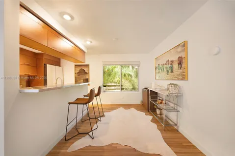 a bed room with a bed and a chair