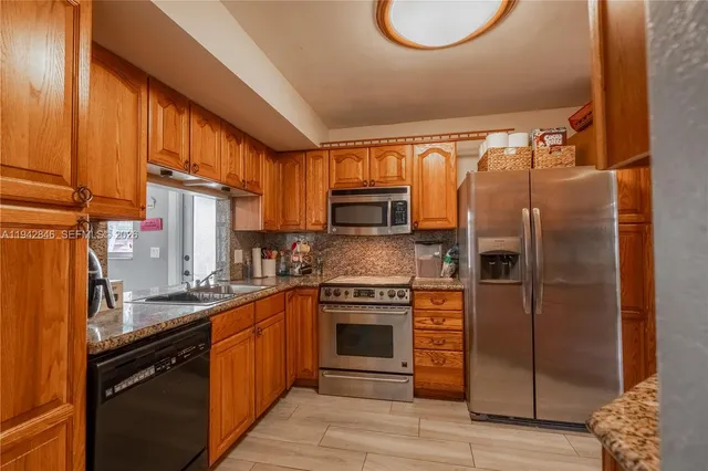 $638,995 | 11700 Sheridan Street, Pembroke Pines, FL 33026