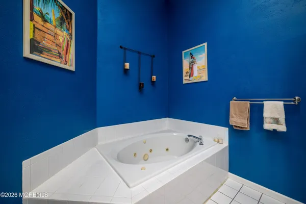 a bathroom with a white tub