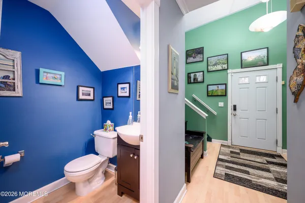 a bathroom with a toilet and a sink