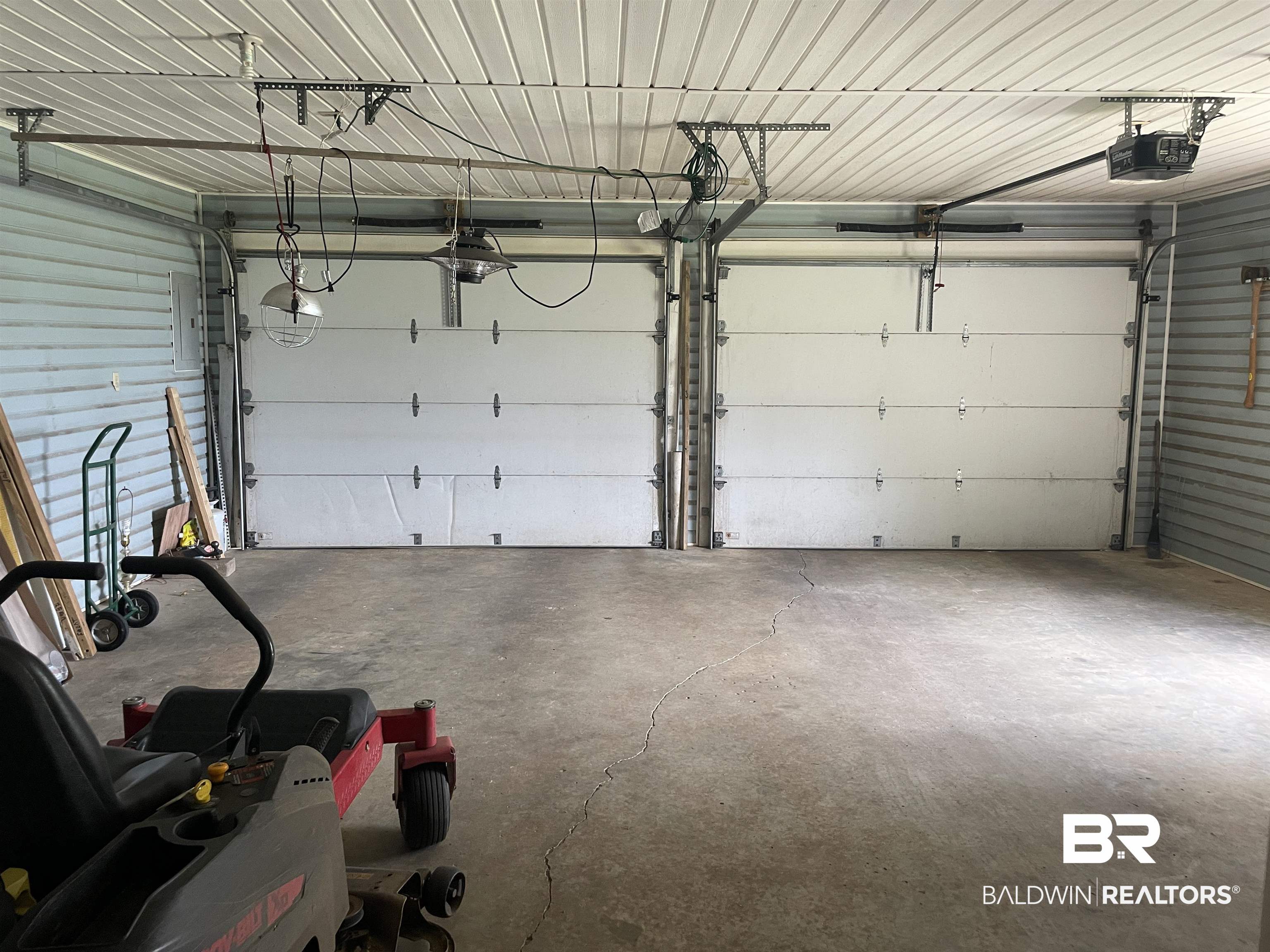 739 Smithfield Road Atmore, AL 36502 - Photo 12 of 18 Garage with a garage door opener