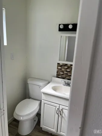 a bathroom with a sink and a toilet