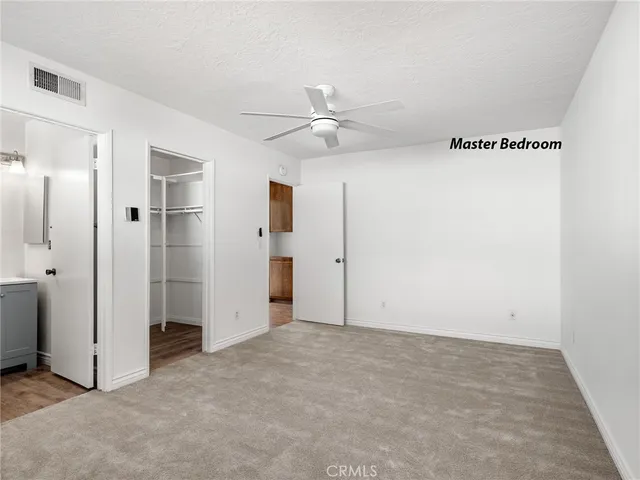 a view of a room with racks on the wall