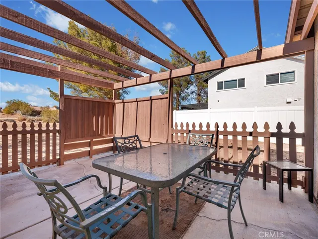 a view of an outdoor space with furniture