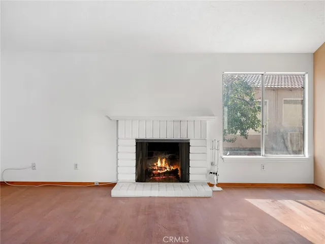 a living room with a fireplace