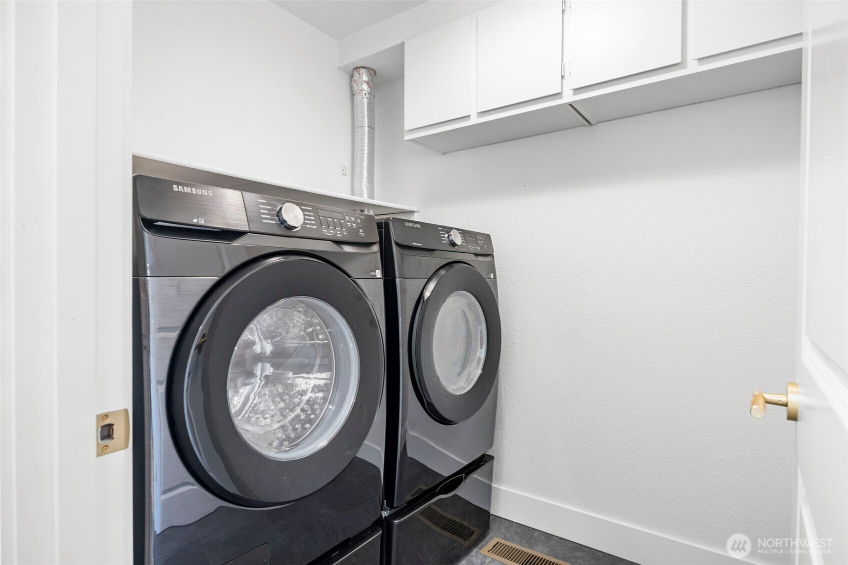121 West Winesap Road Bothell, WA 98012 - Photo 22 of 29 a utility room with dryer and washer