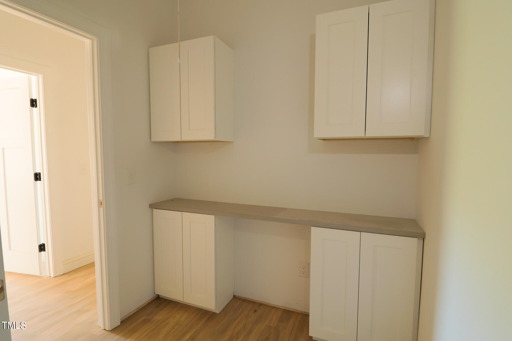 9550 Meredith Drive Rougemont, NC 27572 - Photo 15 of 32 a view of storage and utility room with wooden floor