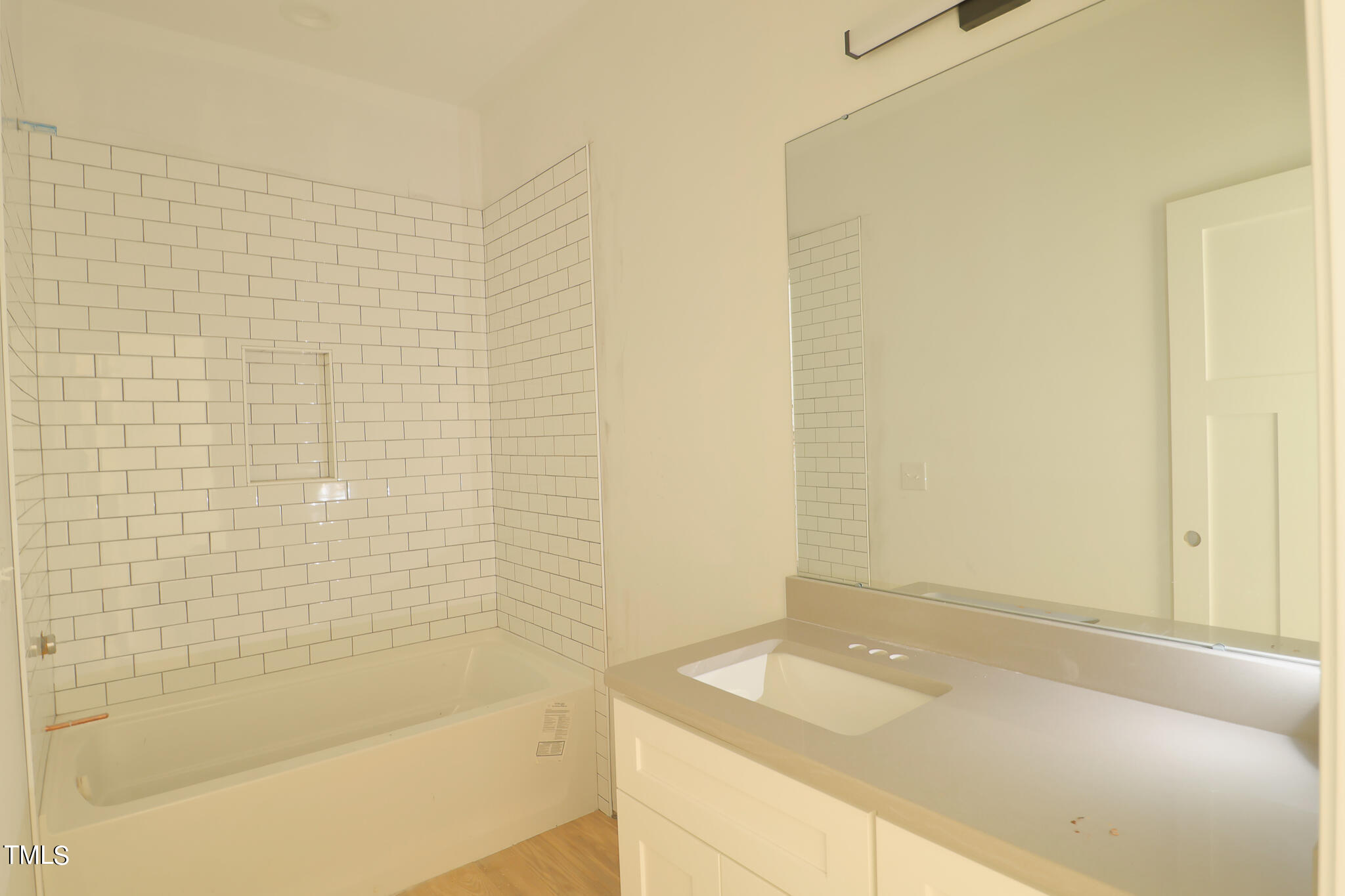 9550 Meredith Drive Rougemont, NC 27572 - Photo 22 of 32 a bathroom with a sink and a bathtub