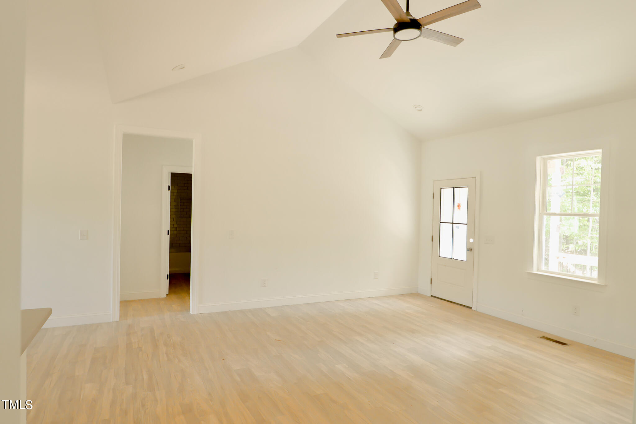 9550 Meredith Drive Rougemont, NC 27572 - Photo 23 of 32 an empty room with windows and closet