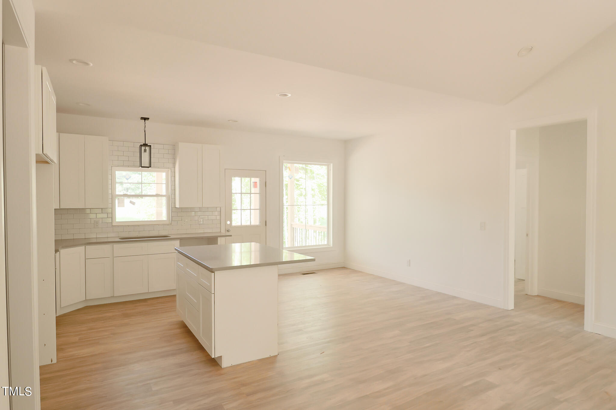 9550 Meredith Drive Rougemont, NC 27572 - Photo 24 of 32 a bathroom with a sink and a large mirror