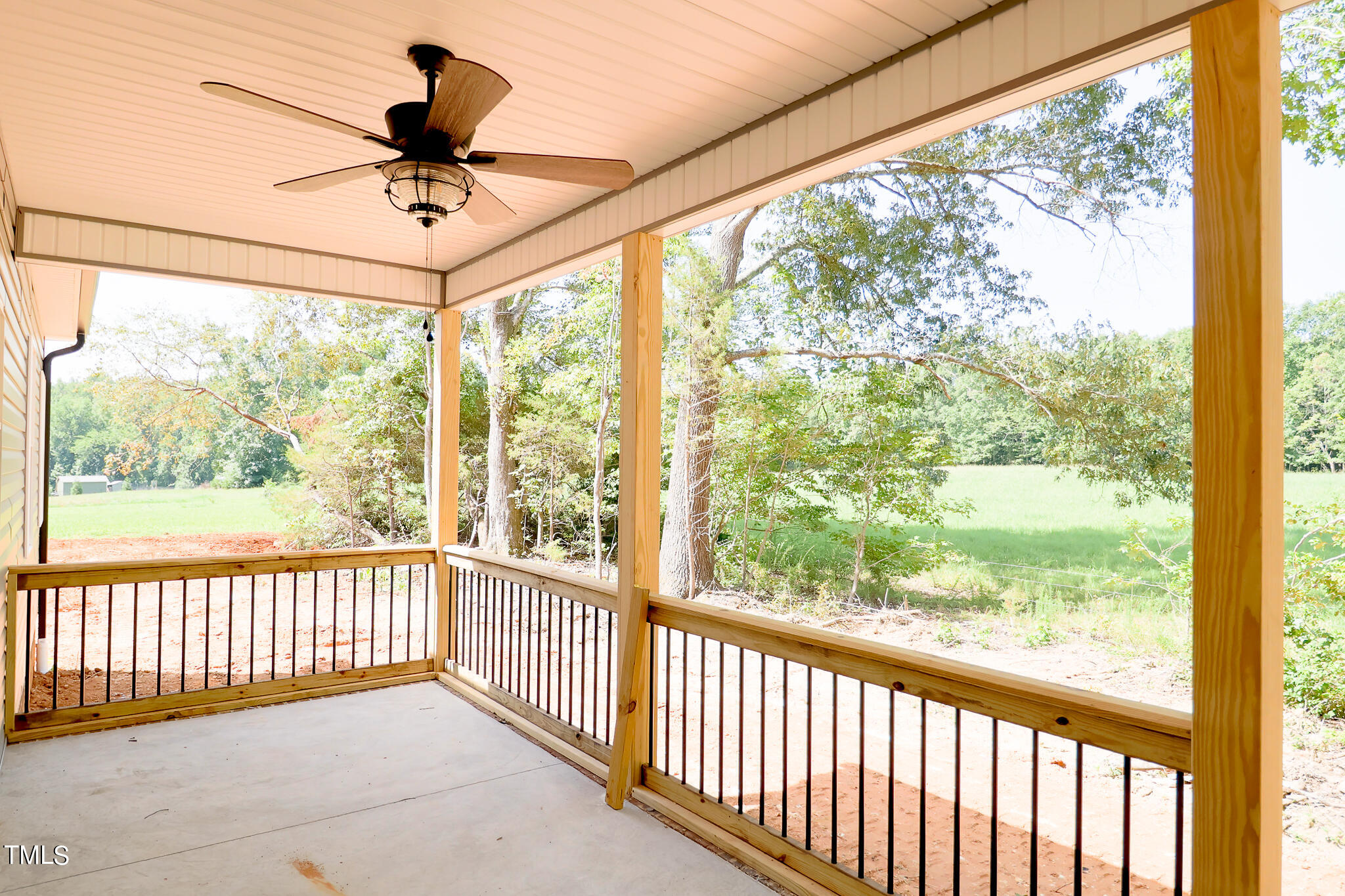 9550 Meredith Drive Rougemont, NC 27572 - Photo 27 of 32 a view of a balcony with a ceiling fan