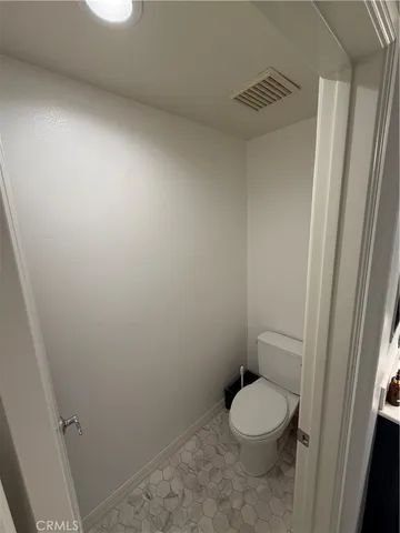 a bathroom with a toilet