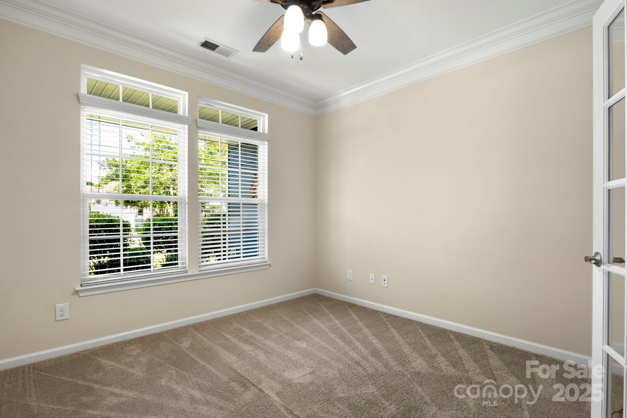 15709 Kiser Corner Lane Davidson, NC 28036 - Photo 22 of 42 a view of an empty room with a window