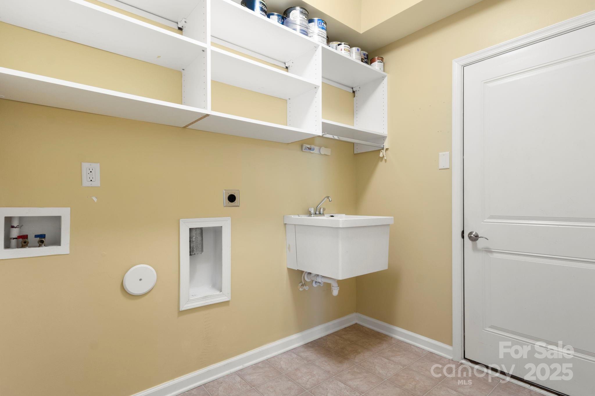 15709 Kiser Corner Lane Davidson, NC 28036 - Photo 28 of 42 a view of a storage & utility room with a sink