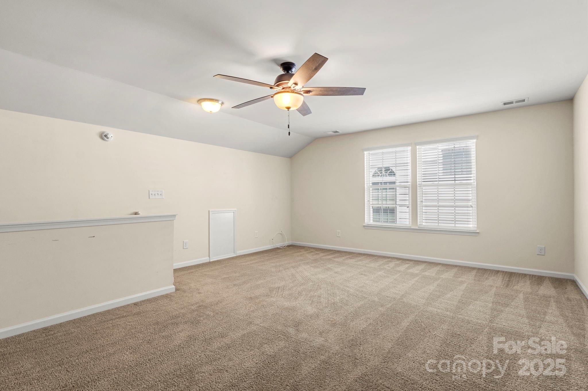 15709 Kiser Corner Lane Davidson, NC 28036 - Photo 31 of 42 a view of an empty room with a window