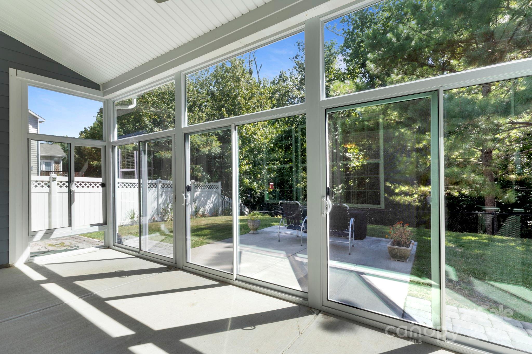 15709 Kiser Corner Lane Davidson, NC 28036 - Photo 35 of 42 a room with a large window and a bed