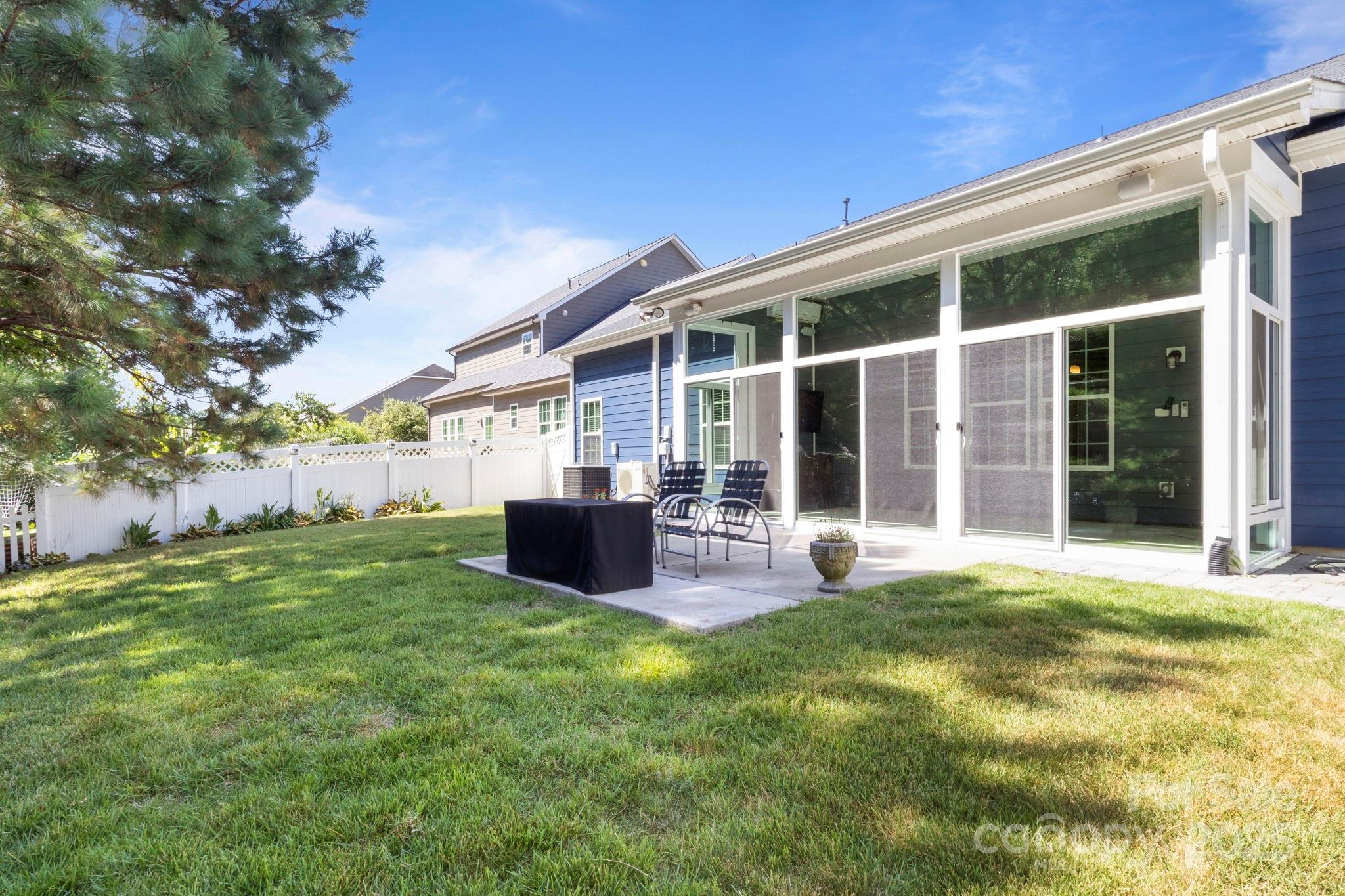 15709 Kiser Corner Lane Davidson, NC 28036 - Photo 37 of 42 a view of a house with backyard porch and garden