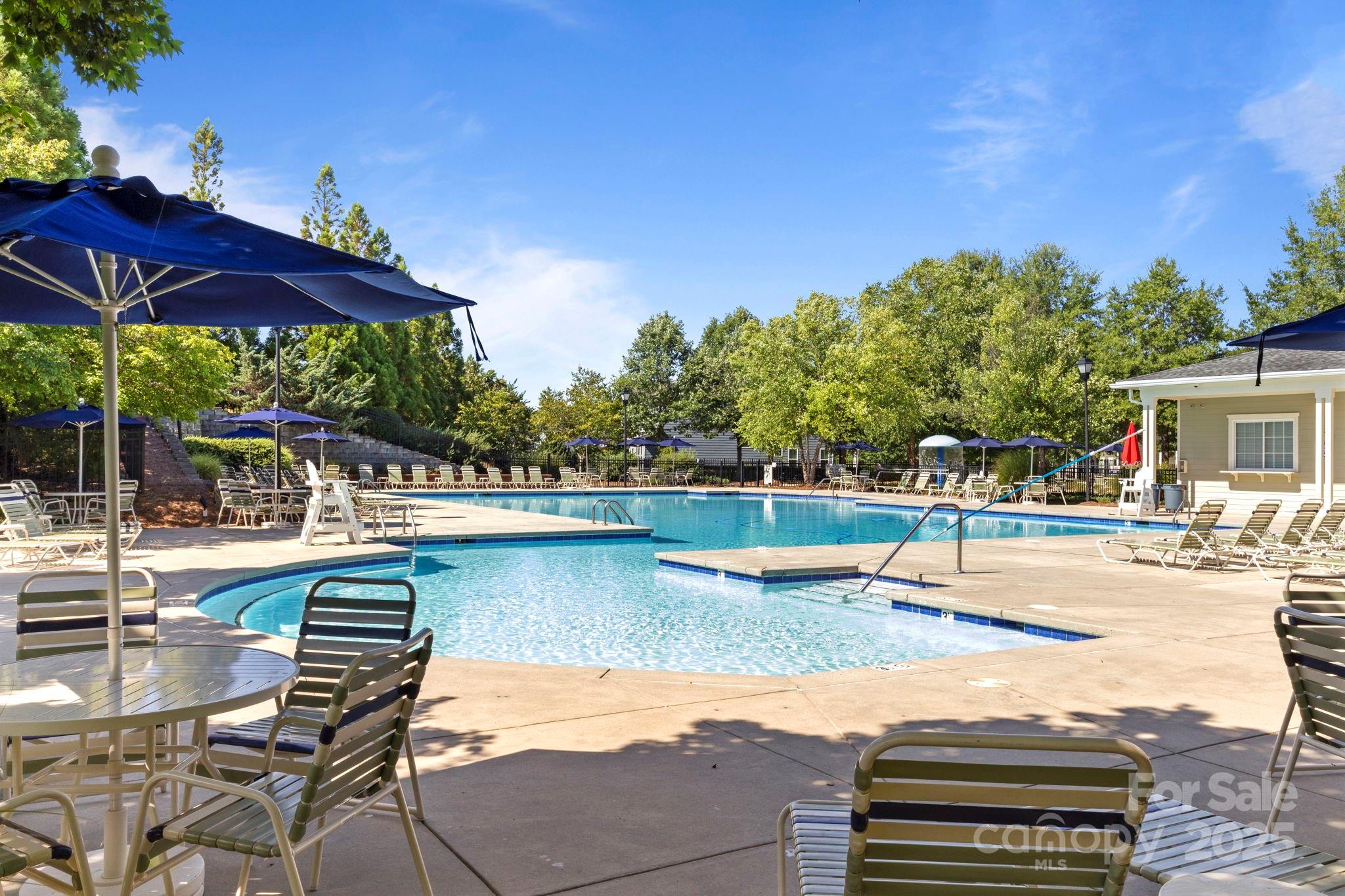 15709 Kiser Corner Lane Davidson, NC 28036 - Photo 40 of 42 a view of a swimming pool with a patio