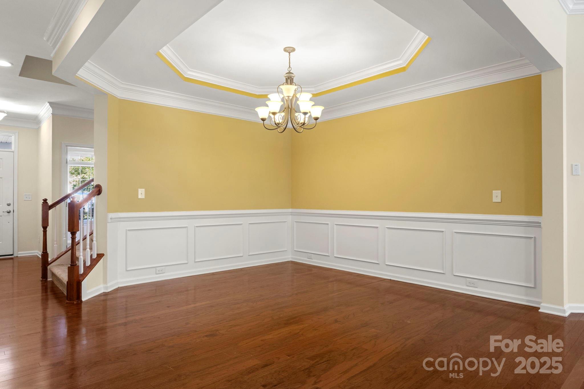 15709 Kiser Corner Lane Davidson, NC 28036 - Photo 4 of 42 a view of an empty room with window and stairs