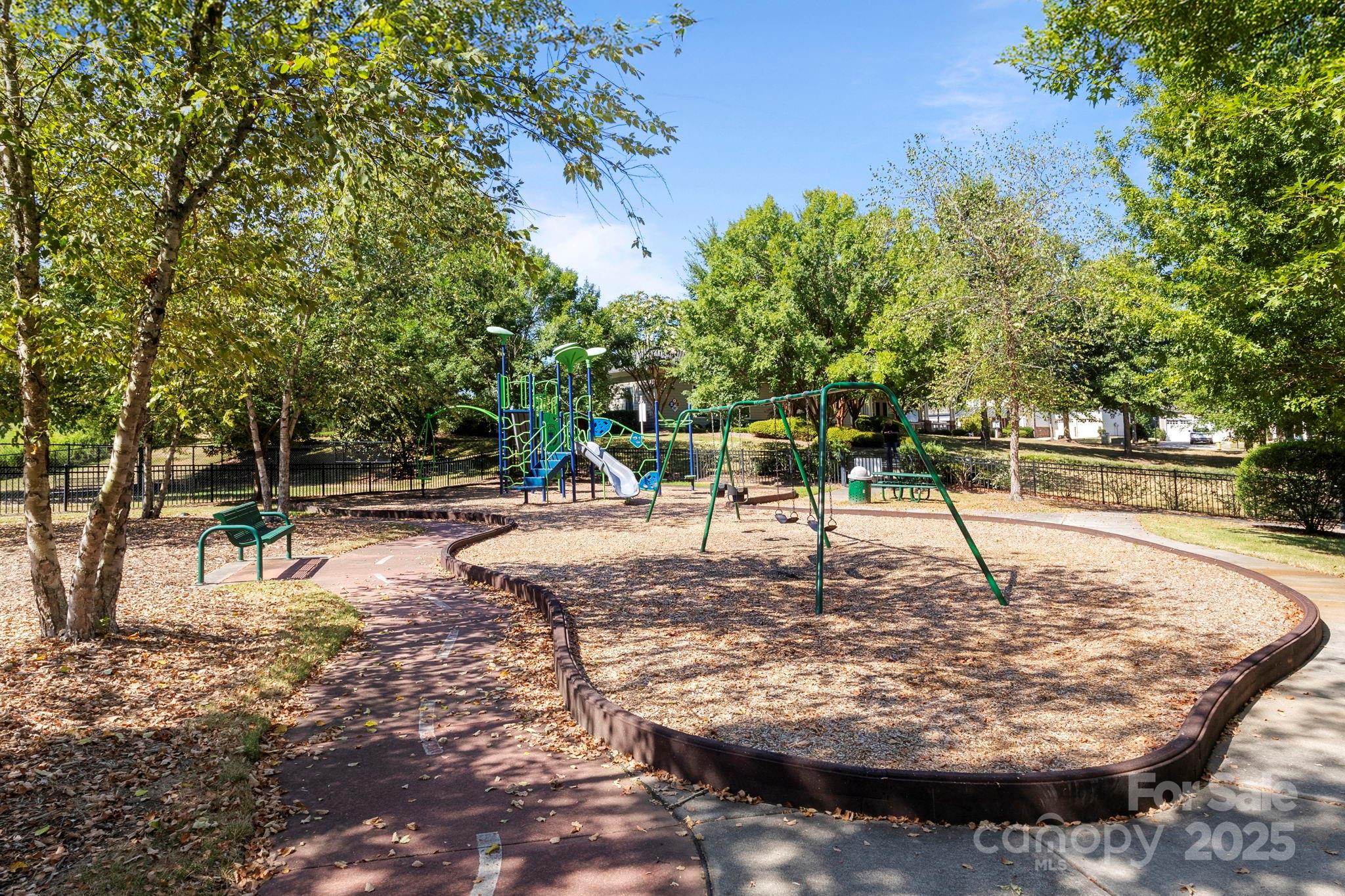 15709 Kiser Corner Lane Davidson, NC 28036 - Photo 41 of 42 a view of a park with swings