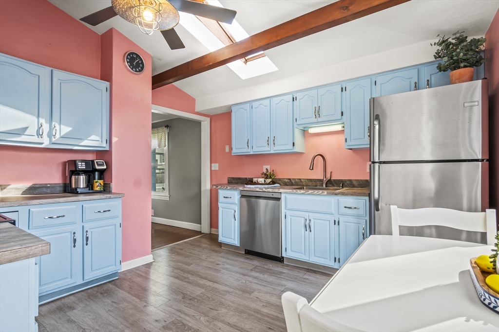 7 Allendale Avenue Billerica, MA 01821 - Photo 11 of 42 a kitchen with sink refrigerator and cabinets