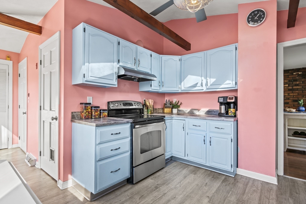 7 Allendale Avenue Billerica, MA 01821 - Photo 12 of 42 a kitchen with stainless steel appliances granite countertop a sink and cabinets