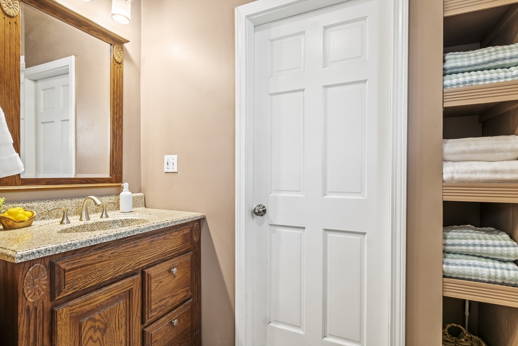 7 Allendale Avenue Billerica, MA 01821 - Photo 17 of 42 a en suite bathroom with a sink and a mirror